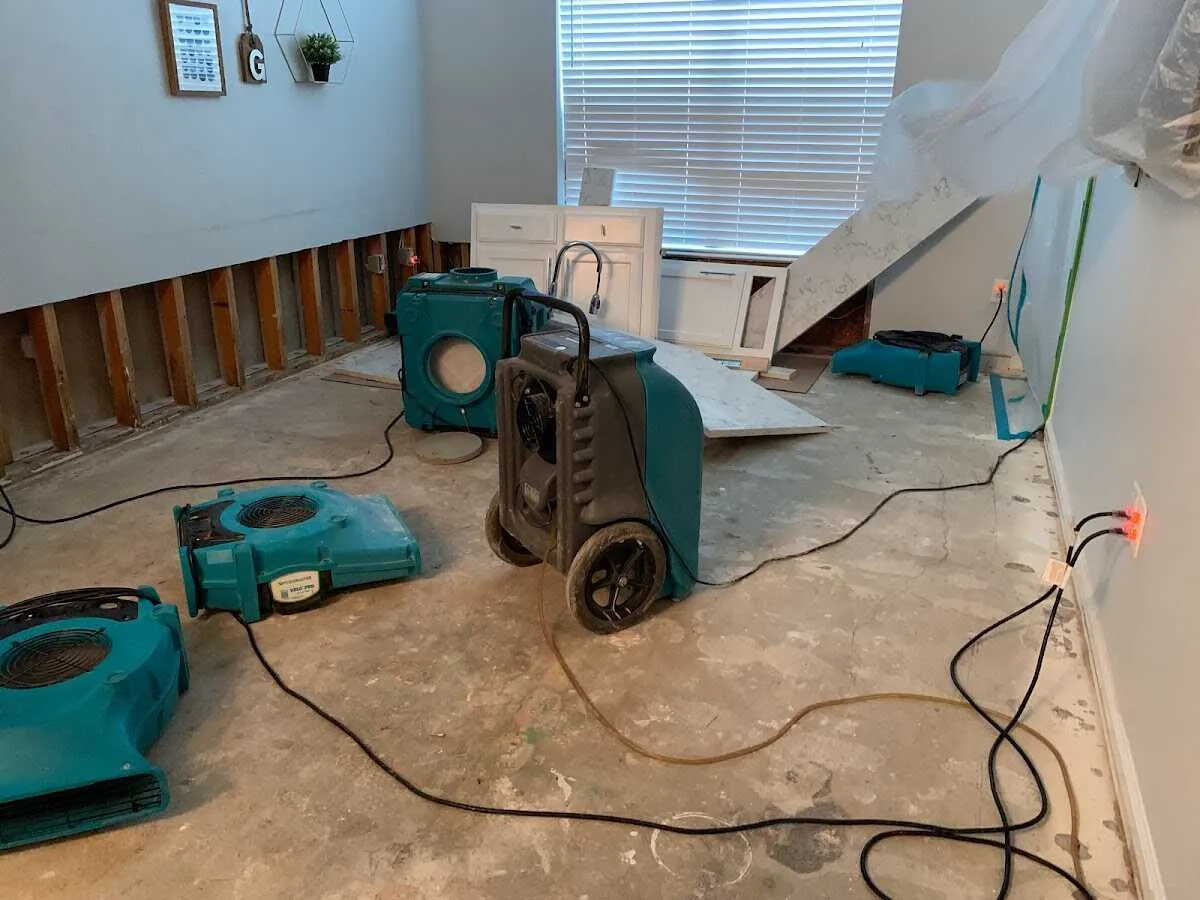 Dehumidifier in flood-cut room for Water Damage Restoration in Stratham